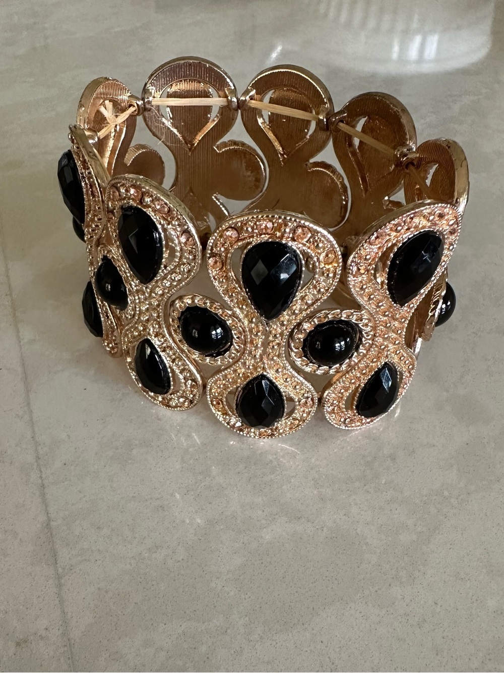 Gold-Tone Bracelet with Black Teardrop Stones